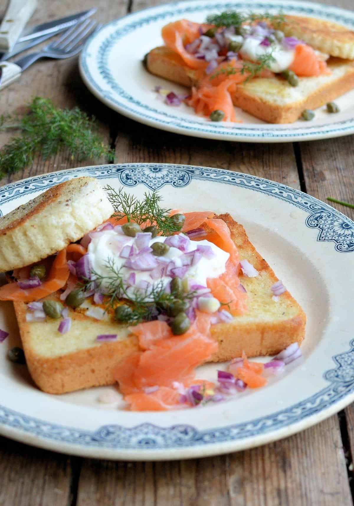  A match made in brunch heaven: perfectly cooked egg nestled in crispy bread and topped with delectable smoked salmon.