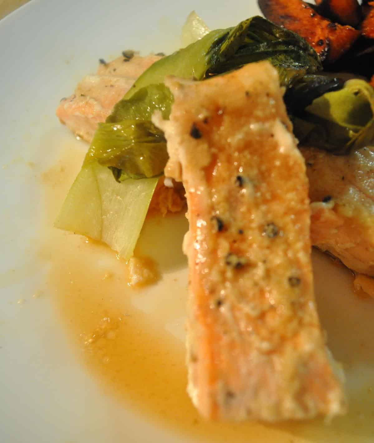  Flaky grilled salmon topped with crisp baby bok choy - the perfect pairing!