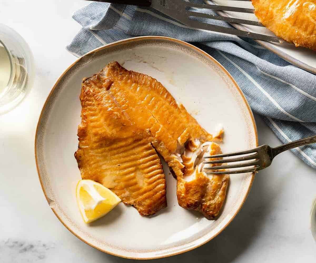  Flavorful and flaky tilapia smothered in a sticky glaze.