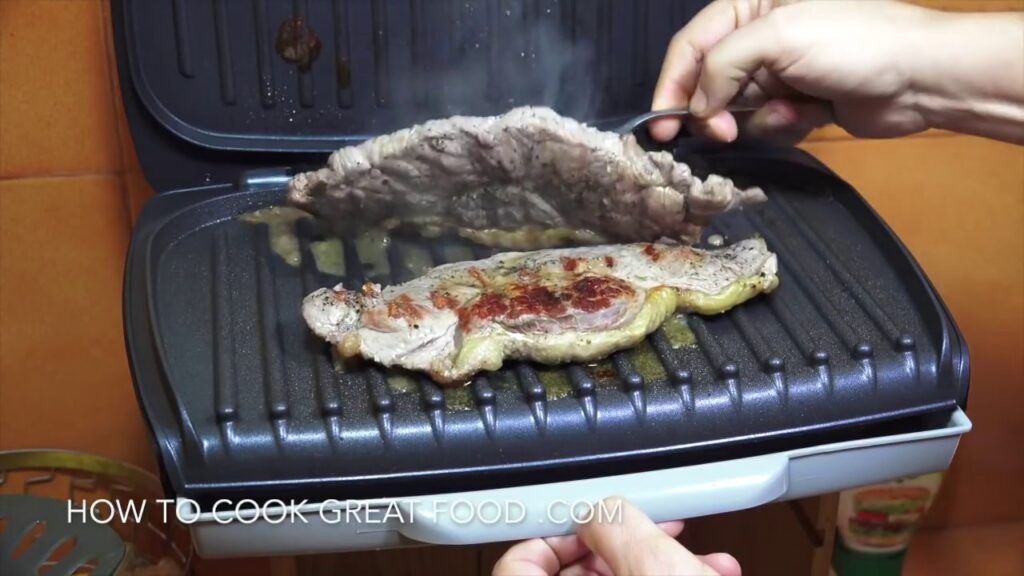 grilling steak on a George Foreman grill