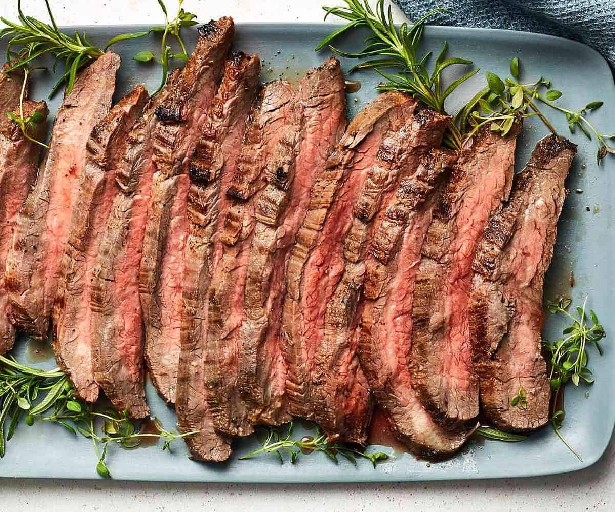  Juicy grilled London Broil, seasoned to perfection with rosemary.