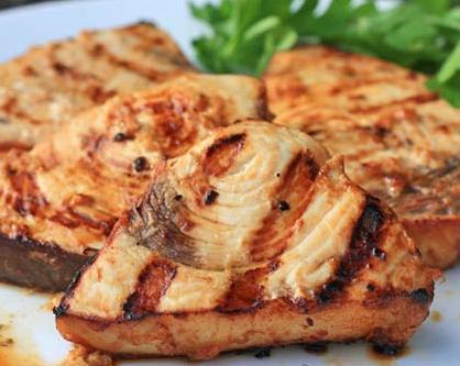  Perfectly cooked swordfish steaks with a crispy exterior