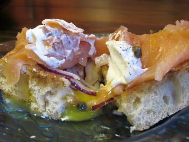  Spruce up your breakfast game with this savory and flaky smoked salmon delight.