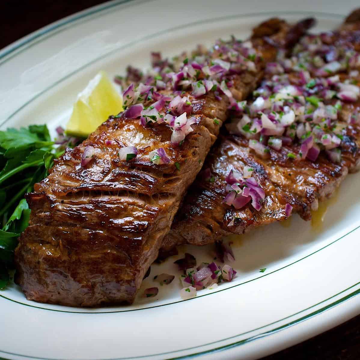  Take a trip to Havana without leaving your backyard with this delicious grilled steak.