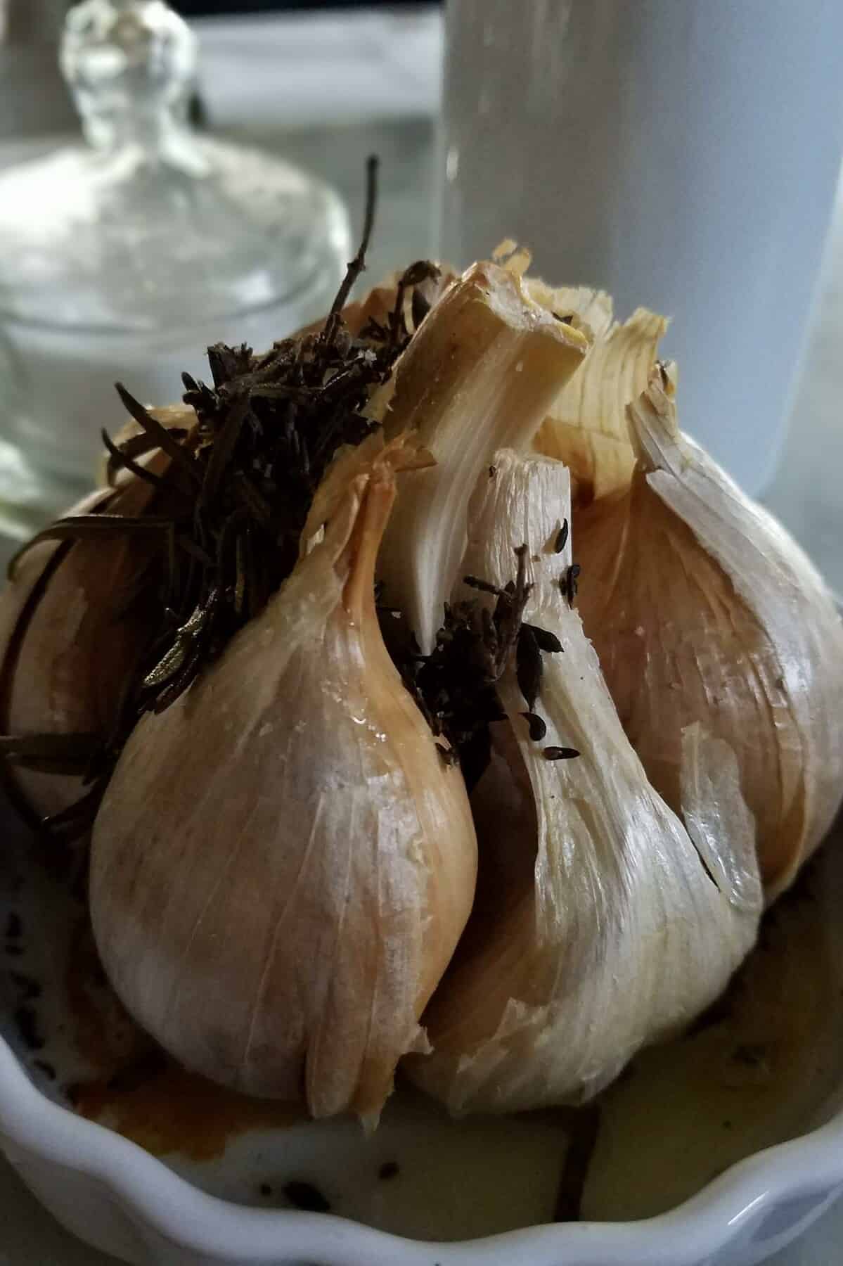  Whole elephant garlic bulbs sitting atop the hot grill grates.
